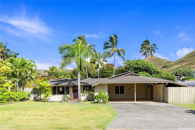 439 Ilimano St, Kailua, HI 96734 - ranch-style house featuring concrete driveway and a carport