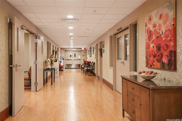 1314 Kalakaua Ave Unit 302, Honolulu, HI 96826 - hallway with light wood-style flooring and a drop ceiling