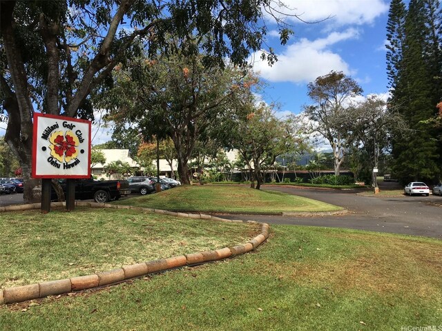 94-333 Hokuahiahi St Unit 103, Mililani, HI 96789 - surrounding community with a yard and uncovered parking