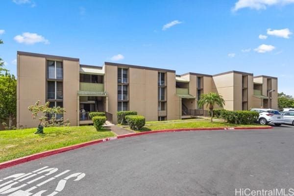 94-333 Hokuahiahi St Unit 103, Mililani, HI 96789 - view of apartment building / complex with uncovered parking