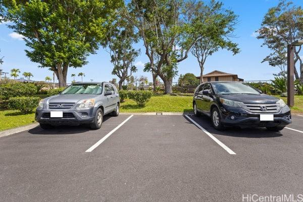 94-333 Hokuahiahi St Unit 103, Mililani, HI 96789 - view of uncovered parking lot