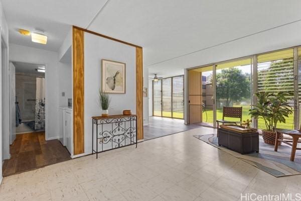 94-333 Hokuahiahi St Unit 103, Mililani, HI 96789 - community lobby with a wall of windows