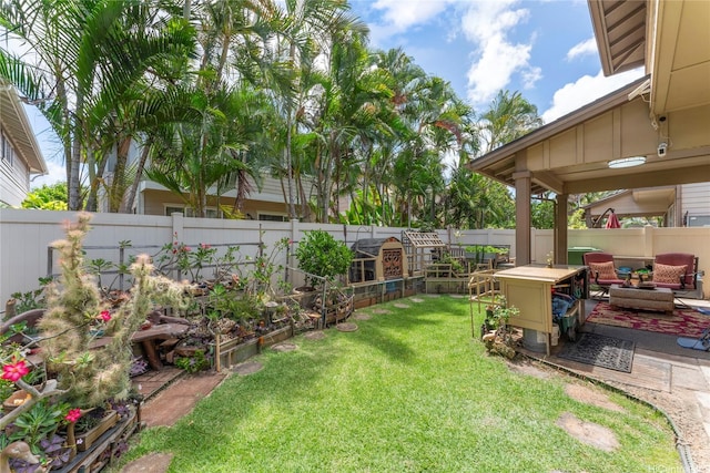 91-1200 Keaunui Dr Unit 110, Ewa Beach, HI 96706 - fenced backyard featuring an outdoor living space, a patio, and a garden