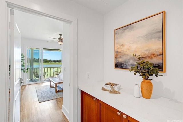 91-1227 Kuanoo St, Ewa Beach, HI 96706 - corridor with light wood-type flooring and a water view