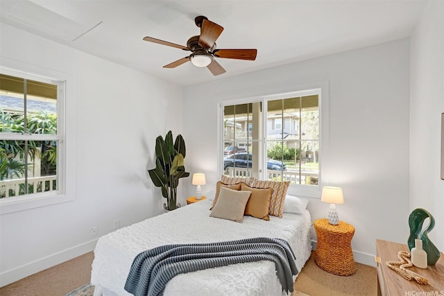 91-1227 Kuanoo St, Ewa Beach, HI 96706 - bedroom with multiple windows, carpet flooring, and a ceiling fan