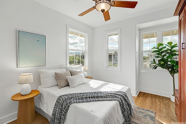 91-1227 Kuanoo St, Ewa Beach, HI 96706 - bedroom featuring light wood-style floors and a ceiling fan