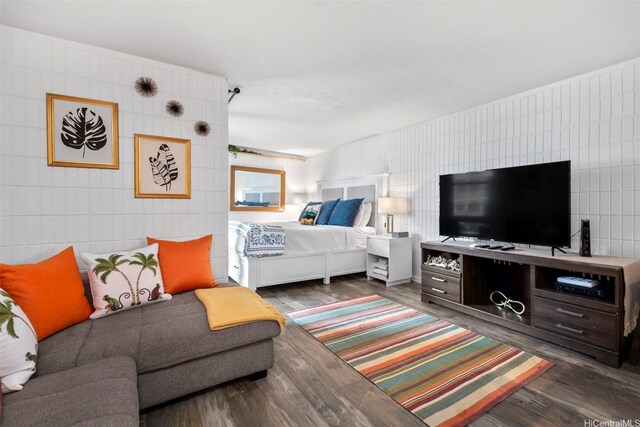 53-567 Kamehameha Hwy Unit 203, Hauula, HI 96717 - bedroom featuring wood finished floors and tile walls
