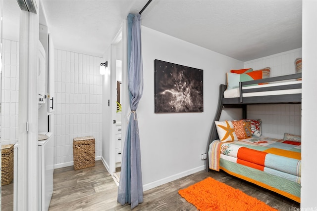 53-567 Kamehameha Hwy Unit 203, Hauula, HI 96717 - bedroom with wood finished floors and baseboards