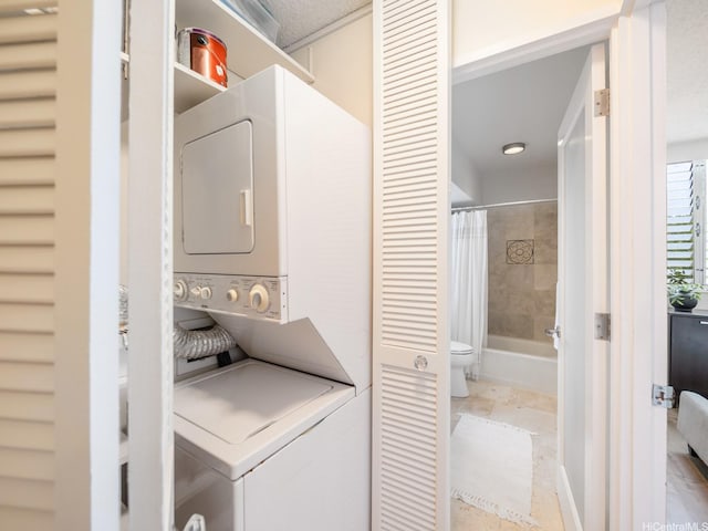 1545 Nehoa St Unit 101, Honolulu, HI 96822 - washroom with stacked washer / dryer