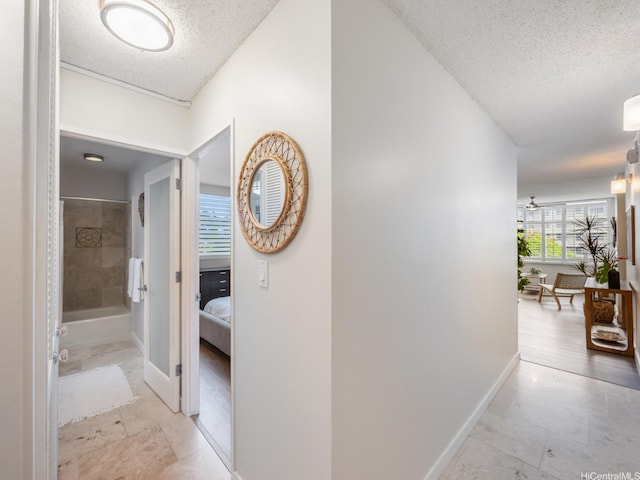 1545 Nehoa St Unit 101, Honolulu, HI 96822 - corridor with a textured ceiling and tile patterned flooring