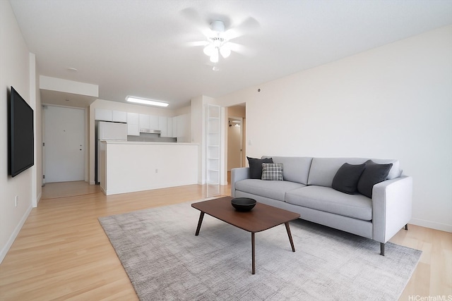 1448 Young St Unit 202, Honolulu, HI 96814 - living room with light wood finished floors and baseboards
