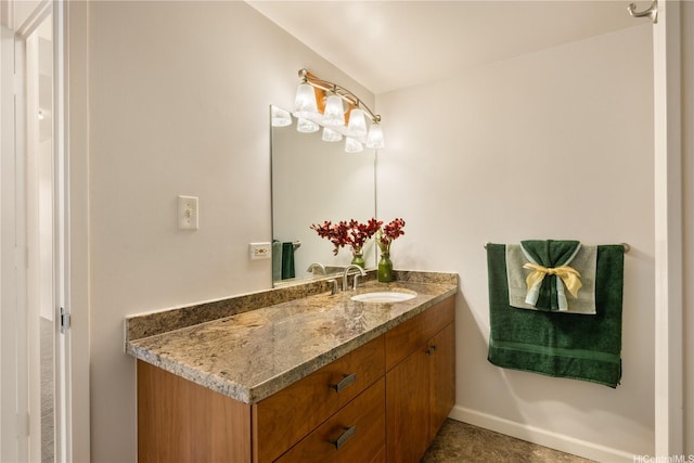 2825 S King St Unit 2403, Honolulu, HI 96826 - bathroom with vanity and baseboards