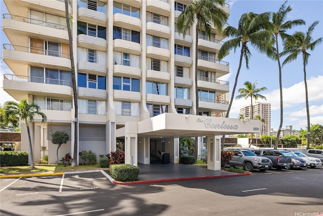 2825 S King St Unit 2403, Honolulu, HI 96826 - view of apartment building / complex featuring uncovered parking