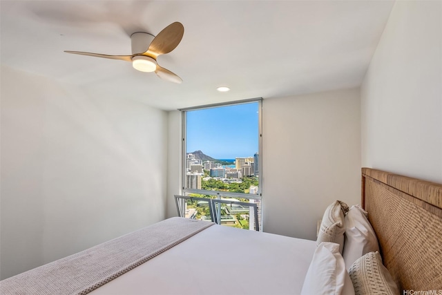 469 Ena Rd Unit 3404, Honolulu, HI 96815 - bedroom featuring a wall of windows, a city view, a ceiling fan, and recessed lighting