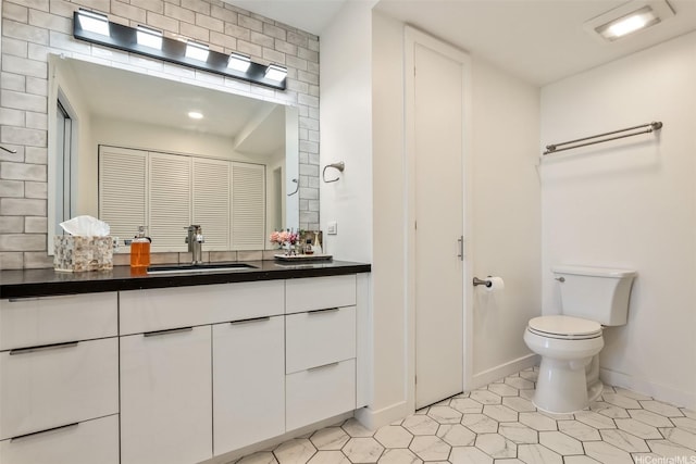 469 Ena Rd Unit 3404, Honolulu, HI 96815 - bathroom featuring vanity, tile patterned floors, and a closet
