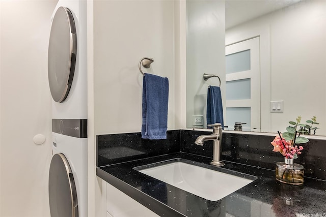 469 Ena Rd Unit 3404, Honolulu, HI 96815 - bathroom with estacked washer and dryer and vanity