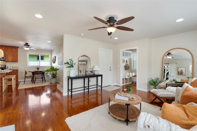 66-912 Kamakahala St Unit 2, Waialua, HI 96791 - living area featuring ceiling fan, wood finished floors, recessed lighting, and a wall mounted AC