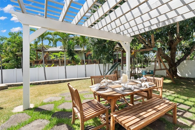 66-912 Kamakahala St Unit 2, Waialua, HI 96791 - fenced backyard featuring outdoor dining space, a pergola, and a patio area