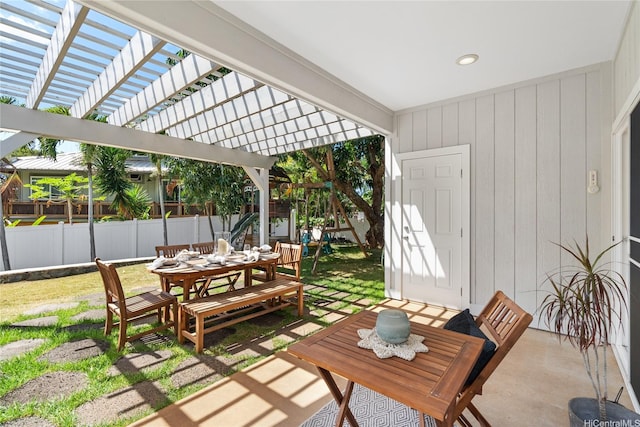 66-912 Kamakahala St Unit 2, Waialua, HI 96791 - view of patio / terrace with outdoor dining space, a playground, and a pergola