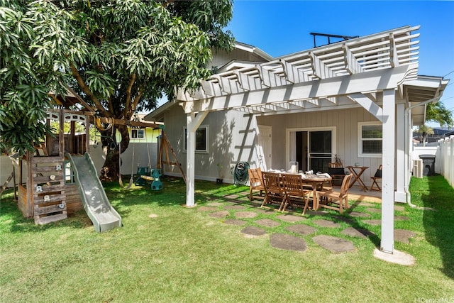 66-912 Kamakahala St Unit 2, Waialua, HI 96791 - back of property with a pergola, a fenced backyard, and a playground
