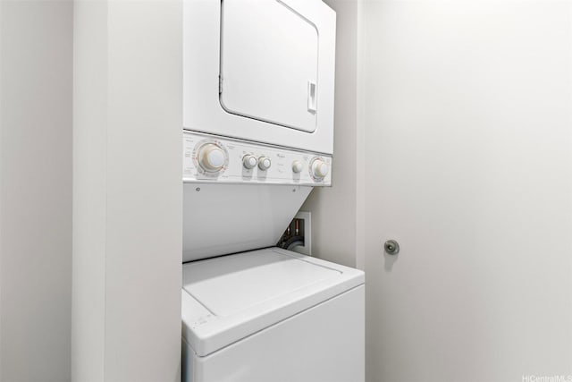 1009 Kapiolani Blvd Unit 1706, Honolulu, HI 96814 - laundry area with stacked washing machine and dryer