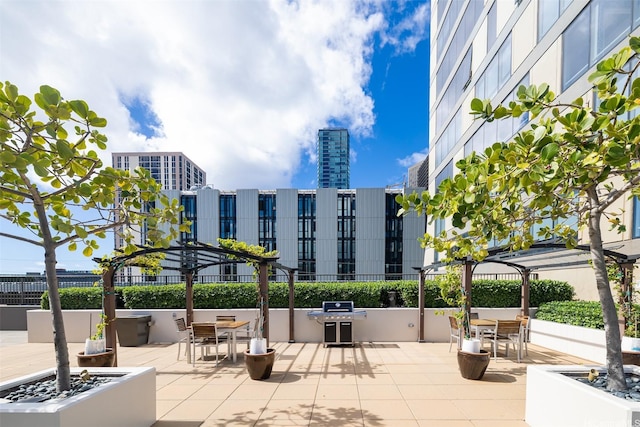 1009 Kapiolani Blvd Unit 1706, Honolulu, HI 96814 - view of community featuring outdoor dining area and a patio area