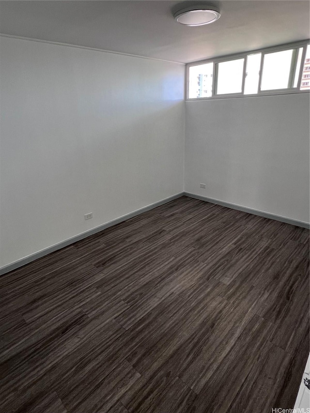 5210 Likini St Unit 901, Honolulu, HI 96818 - unfurnished room featuring dark wood-style flooring