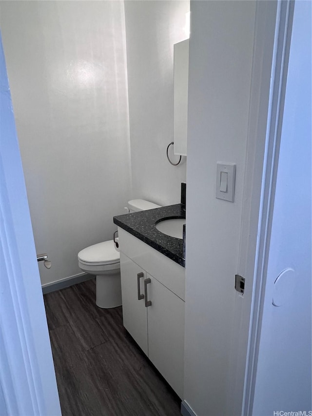 5210 Likini St Unit 901, Honolulu, HI 96818 - half bath with vanity and wood finished floors