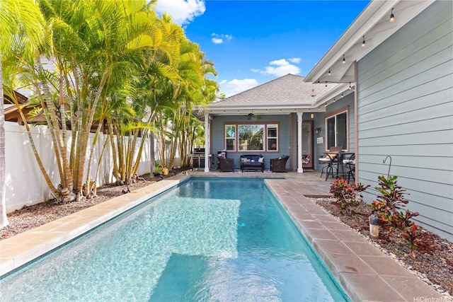 91-1100 Waiemi St, Ewa Beach, HI 96706 - view of pool with outdoor lounge area, ceiling fan, a fenced backyard, a grill, and a patio area