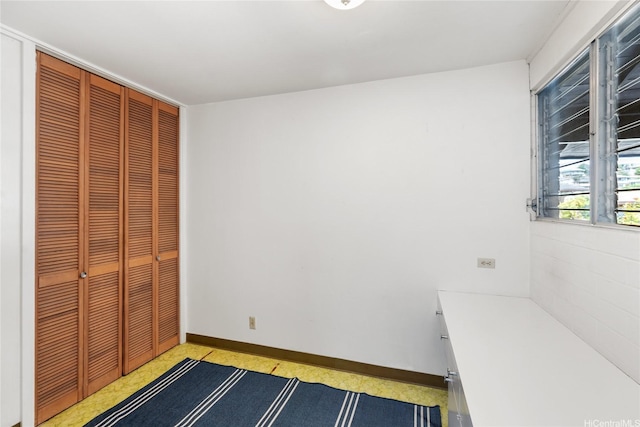 3504 Ala Hapuu St, Honolulu, HI 96818 - unfurnished bedroom featuring a closet and baseboards