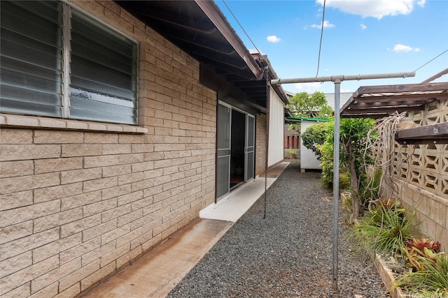 3504 Ala Hapuu St, Honolulu, HI 96818 - view of side of property with brick siding