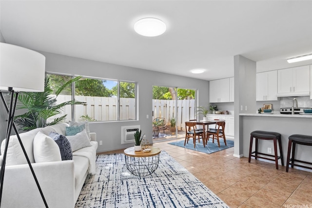 91-1021 Kuina St Unit 119, Ewa Beach, HI 96706 - living area featuring light tile patterned floors and heating unit
