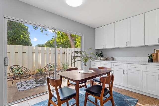 91-1021 Kuina St Unit 119, Ewa Beach, HI 96706 - dining room with light tile patterned flooring
