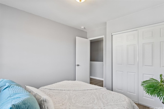 91-1021 Kuina St Unit 119, Ewa Beach, HI 96706 - bedroom featuring wood finished floors and a closet