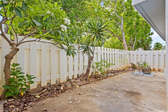 91-1021 Kuina St Unit 119, Ewa Beach, HI 96706 - fenced backyard with a patio area