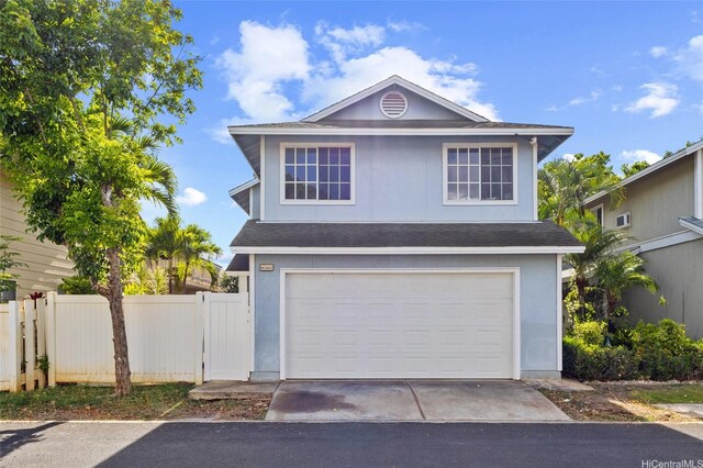 91-1021 Kuina St Unit 119, Ewa Beach, HI 96706 - traditional home with a garage, a shingled roof, asphalt driveway, and stucco siding