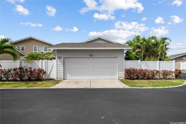 91-1108 Kaihohonu St, Ewa Beach, HI 96706 - ranch-style home featuring driveway, a garage, and roof with shingles