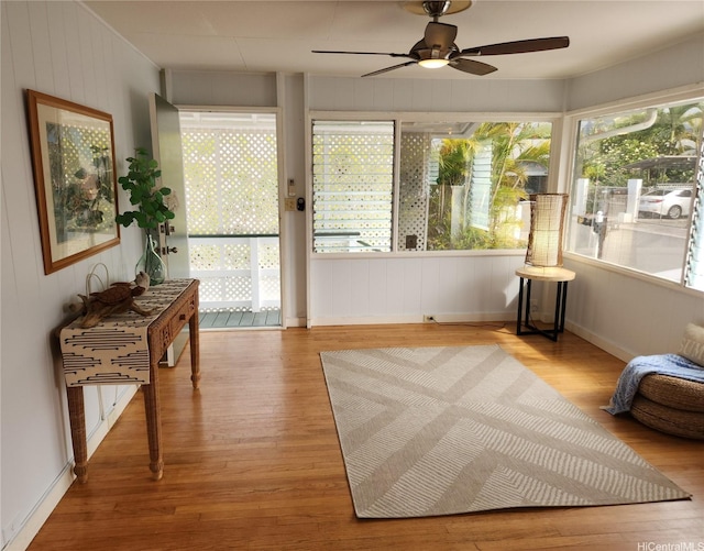 327 Hualani St Unit B, Kailua, HI 96734 - unfurnished sunroom with wood finished floors and wood walls