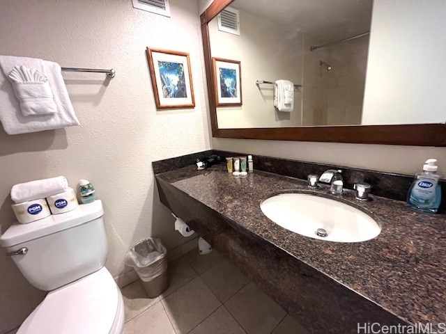 2045 Kalakaua Ave Unit 402, Honolulu, HI 96815 - bathroom with tile patterned floors and vanity