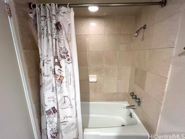 2045 Kalakaua Ave Unit 402, Honolulu, HI 96815 - bathroom featuring shower / bath combo with shower curtain