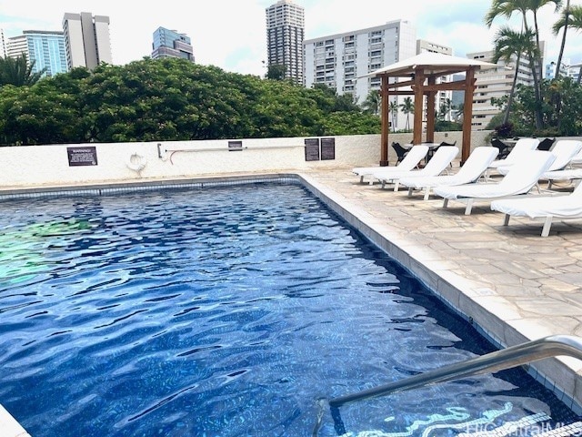 2045 Kalakaua Ave Unit 402, Honolulu, HI 96815 - outdoor pool with a patio area and a view of city