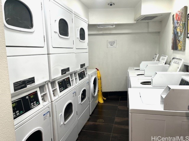 2045 Kalakaua Ave Unit 402, Honolulu, HI 96815 - shared laundry room with stacked washer / dryer and washing machine and dryer