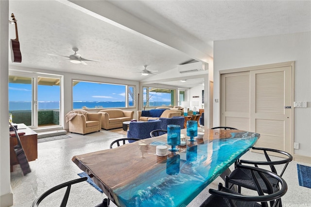 68-665 Hoomana Pl, Waialua, HI 96791 - dining area with a wall unit AC, a textured ceiling, healthy amount of natural light, and ceiling fan