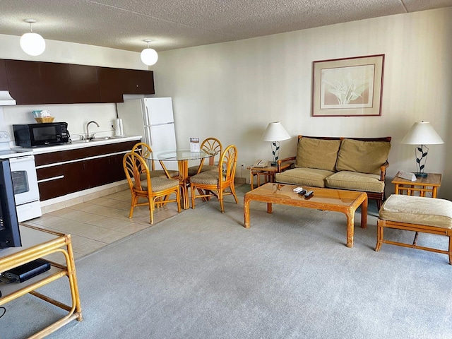 201 Ohua Ave Unit 2406, Honolulu, HI 96815 - living area featuring light carpet and a textured ceiling