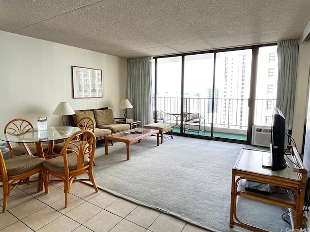 201 Ohua Ave Unit 2406, Honolulu, HI 96815 - living room featuring a wall of windows, a textured ceiling, light tile patterned floors, and light colored carpet