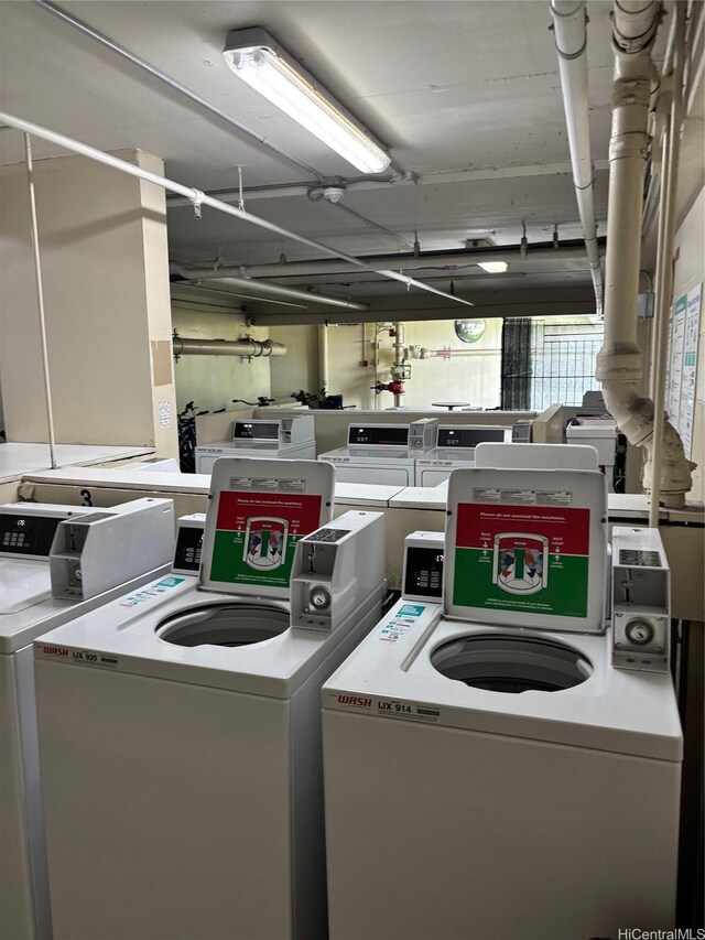 1616 Liholiho St Unit 803, Honolulu, HI 96822 - washroom featuring washer and dryer