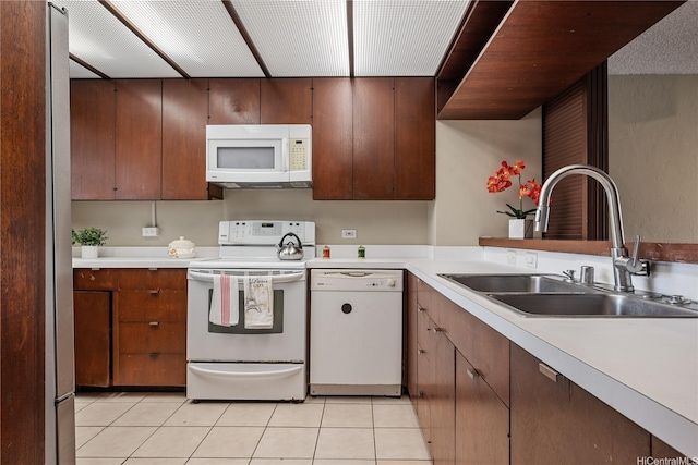 500 Lunalilo Home Rd Unit 24K, Honolulu, HI 96825 - kitchen with white appliances, light countertops, and light tile patterned flooring
