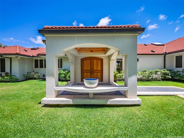 3124 Noela Dr, Honolulu, HI 96815 - rear view of house featuring a yard, stucco siding, and a tile roof