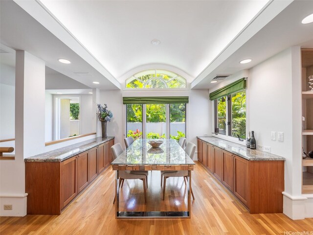 3124 Noela Dr, Honolulu, HI 96815 - dining room with lofted ceiling, light wood-style floors, healthy amount of natural light, and recessed lighting