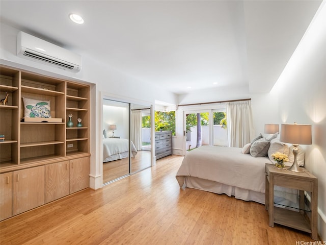 3124 Noela Dr, Honolulu, HI 96815 - bedroom with access to outside, an AC wall unit, light wood finished floors, and recessed lighting